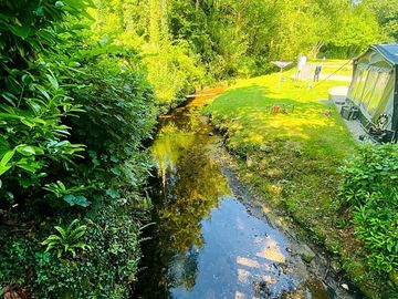 Pitches next to stream