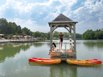 Kayaks and diving platform on the lake