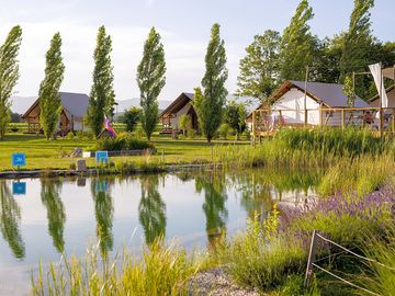 Looking across the lake to the tents