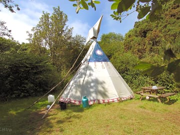 Tipi set up on the private site