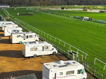 Camper vans and caravans on hardstanding at fakenham racecourse