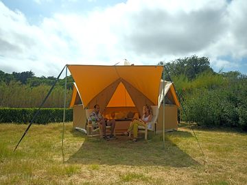 Glamping tent in a field