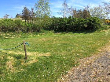 Medium-size grass pitch with an electric hook-up