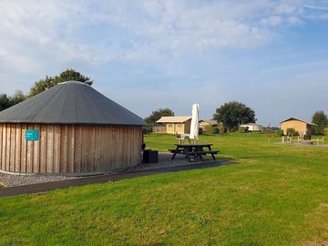 Wooden yurts and classic safari tents at daleacres campsite