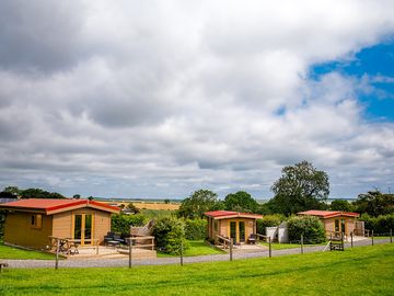 Lodges separated by hedging
