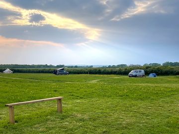 Happy campers with stunning sunset
