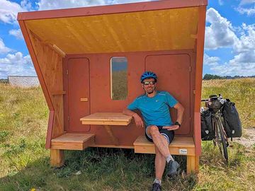 Sheltered seating outside a microlodge