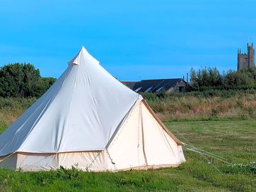 The bells tents are big enough for 5 to sleep in and have coir matting on the floor
