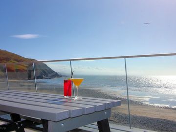 Outdoor terrace with seafront views