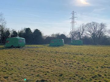 Camping field surrounded by trees