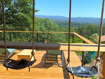 Terrace with swings