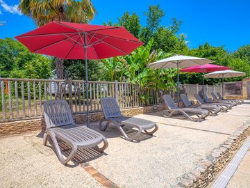 Sun loungers poolside