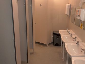 Ladies toilets with shower.