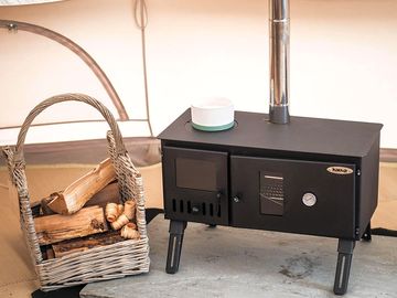 Log burner and oven to make the tent cosy on those chilly nights