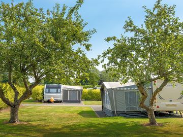 Sunny, spacious premier hard standing pitches at Arrow Bank