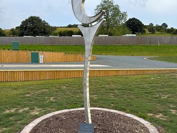 Our 'ripples' wind dial created by a local artist, in our gardens