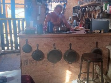 Paul, whipping up something tasty in the kitchen