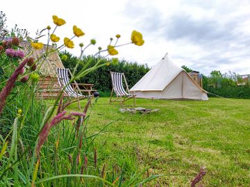 Non-electric grass tent pitch with space for a bell tent