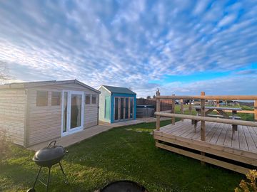 Poppy with her separate kitchen and private raised deck with hot tub