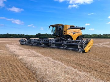 Combine harvester on the farm
