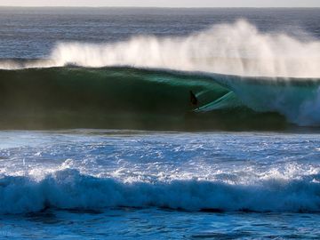 Surfing in front of Gala Gala