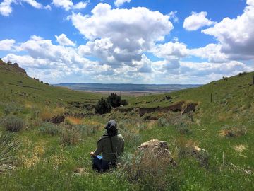 Peaceful prairie campers enjoy beautiful vistas and open skies.