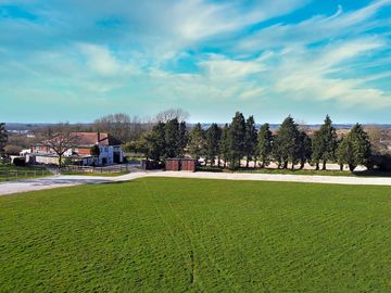 View of pitches on the main campsite and the red lion pub