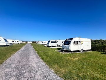 Fully-serviced hardstanding touring pitch