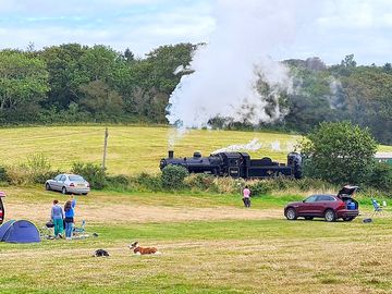 Train going past the site