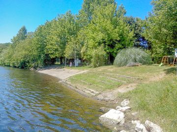 Sunbathe by the river