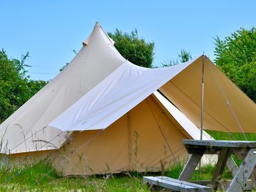 Simplify. hire one of our bell tents.