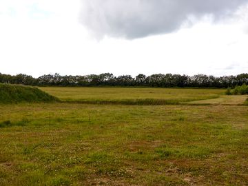 Grass motorhome and tent area
