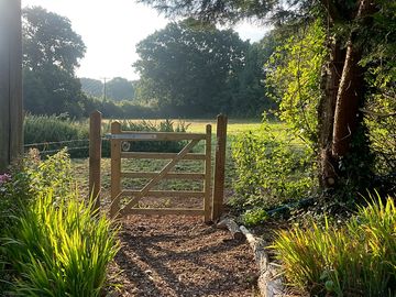 Gate between the pub, beer garden and pitches