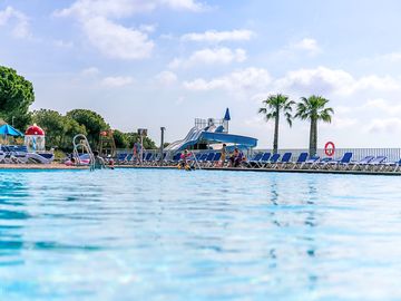 Swimming pool with slides