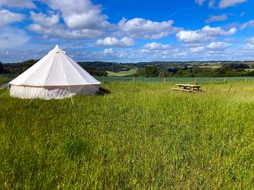 Bell tent with picnic table