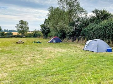 Non-electric grass tent pitch
