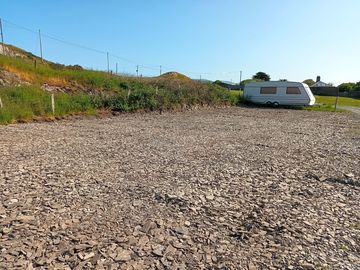 Compacted shale hard standing pitch