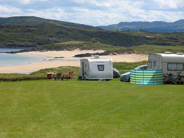 Electric grass pitches with sea views and direct access to beach