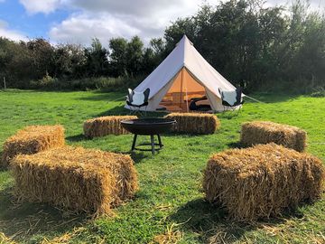 Bell tent with deluxe furnishing upgrade (extra cost)