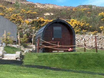 The red tractor camping pod.