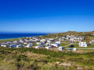 Serviced grass pitches by the coast