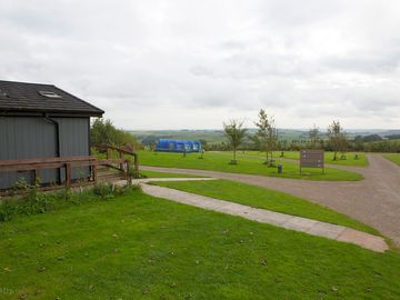 View on entry to the site with shower/toilet block to the left
