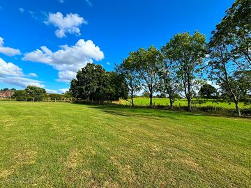 The top half of the camping field, looking out over fields