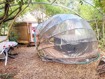 Hot tub and exterior of the yurt