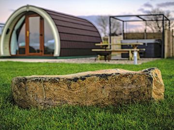 Pod with outdoor seating and hot tub
