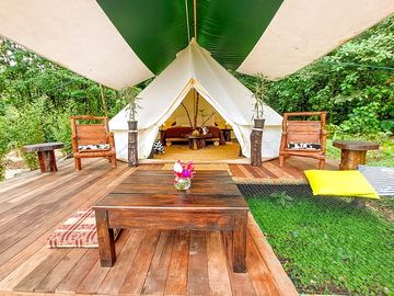 Bell tent on a wooden deck
