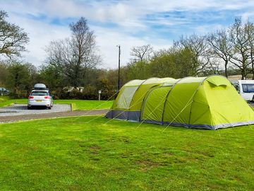Electric optional grass tent or trailer tent pitch
