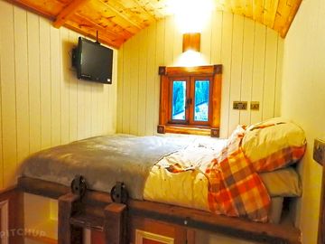 Sleeping area with double bed; linen provided