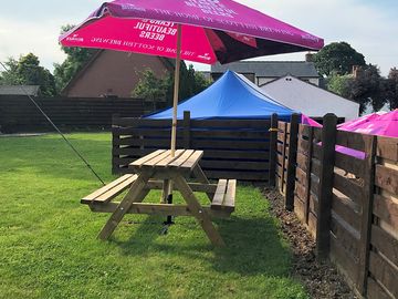 Picnic benches by each pitch