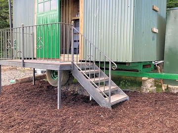 Steps up to shared bathroom
